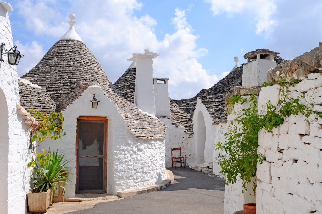 Typical trulli houses with conical roof in Alberobello, Italy